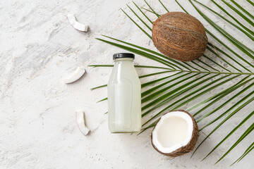 Bottle of fresh coconut water on table