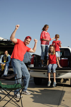 Portrait of family at tailgate party