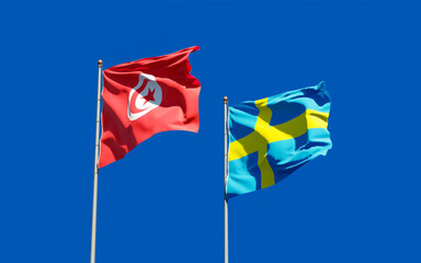 Flags of Tunisia and Sweden.