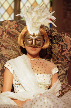 Portrait of a young woman wearing an eye mask