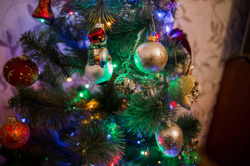 beautiful toys on the christmas tree with garland