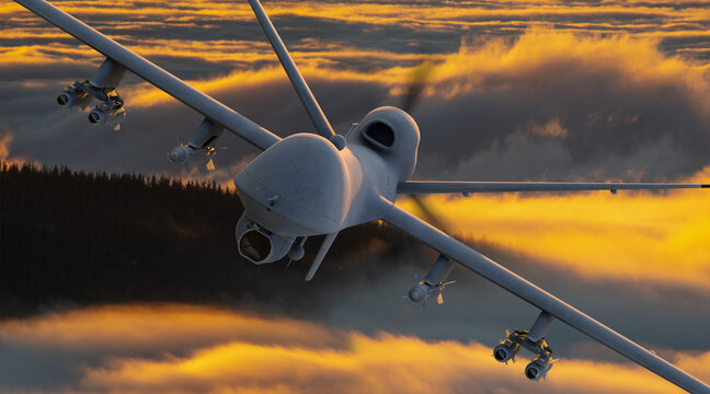 General Atomics MQ-9 Reaper drone flying over the mountains at sunset.