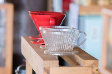 cup of coffee on wood shelf