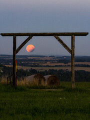 sunset with moon eclipse