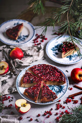 Fototapeta na wymiar Hot spiced apple, cranberry and ginger upside down cake...selective focus