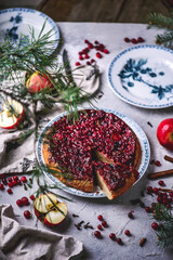 Hot spiced apple, cranberry and ginger upside down cake...selective focus