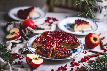 Hot spiced apple, cranberry and ginger upside down cake...selective focus