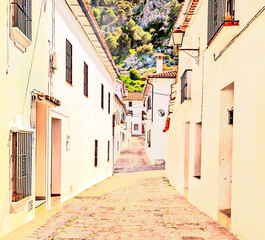 Streets of Grazalema with mountains in the background