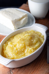 Turkish Cheese Helva Hosmerim with clotted cream and glass of milk.