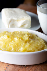 Turkish Cheese Helva Hosmerim with clotted cream and glass of milk.