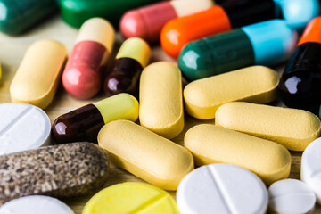Drug prescription for treatment medication. Pharmaceutical medicament, cure in container for health. Pharmacy theme, capsule pills with medicine antibiotic in packages.closeup,Medicine or capsules.