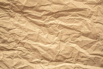 Brown crumpled paper close up texture background