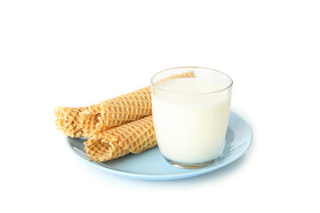 Plate with wafer rolls with condensed milk and milk isolated on white background