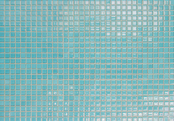 Blue pastel ceramic wall and floor tiles abstract background. Design geometric mosaic texture decoration of the bedroom. Simple seamless pattern for backdrop advertising banner poster or web.