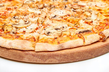Fresh pizza with bacon, mushrooms and cheese on a light background. Close-up, selective focus