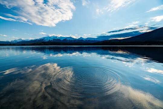 Body of water under blue sky