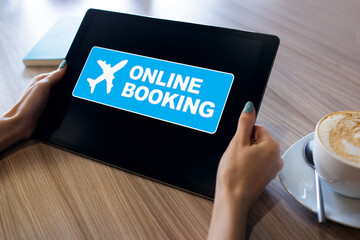 Flight ticket booking online service on device screen. Internet and technology concept.