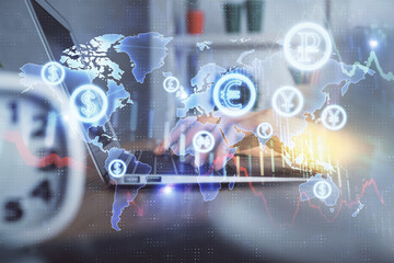 Double exposure of woman hands typing on computer and forex chart hologram drawing. Stock market...
