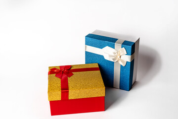 Gift boxes with ribbons on white isolated background