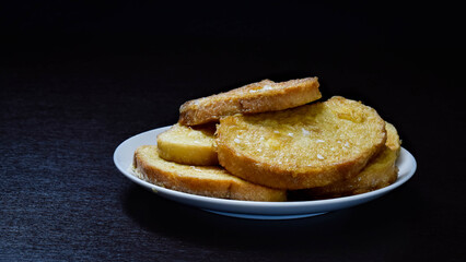 Fried in a pan bread in egg batter. French toast.