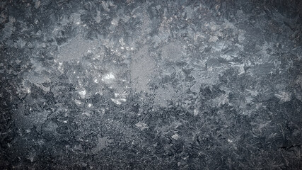 Abstract background. Frosty patterns on glass. High quality photo