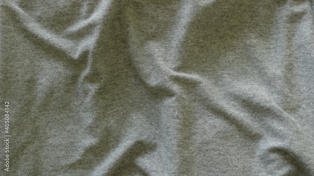 Wall mural crumpled gray cotton fabric with smooth folds on the surface, ash-colored drapery with casual lines 