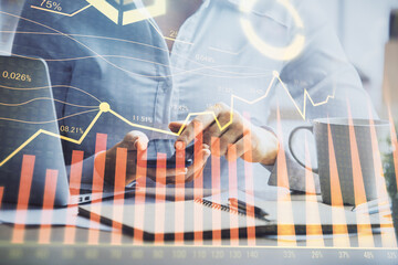 Double exposure of forex chart sketch hologram and woman holding and using a mobile device. Financial market concept.