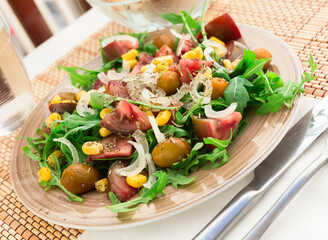 fresh vegetarian healthy vegetable salad with arugula