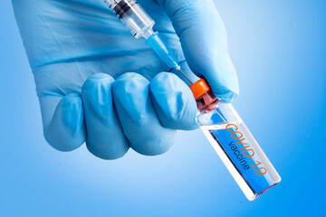 Vaccine and syringe injection at corona virus infection. Concept vaccination COVID-19.