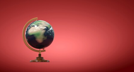 rotating terrestrial globe red background