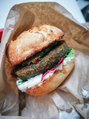 Close up view of Fresh tasty beef burger on table