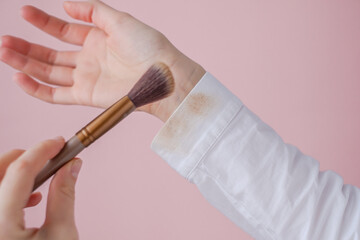 dirty cosmetic stain on a woman's shirt