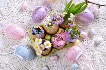Easter decoration with spring flowers in egg shells