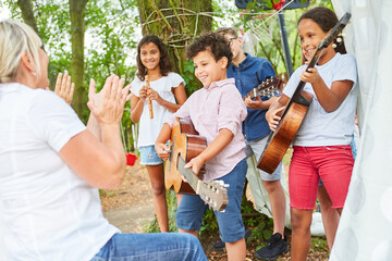 Children have fun performing on the talent show