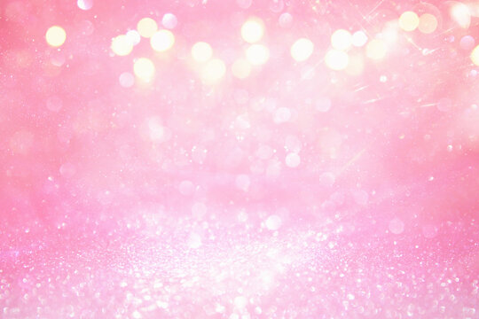 purple and pink glitter vintage lights background. defocused