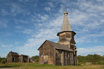 Fototapeta na wymiar Summer landscape with wooden church, Russia