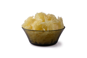 bowl of grapefruit slices isolated on white background