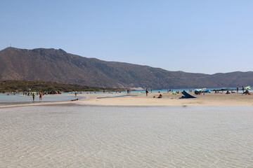 Tourists on the beautiful beach of Elafonisi in Crete, Greece