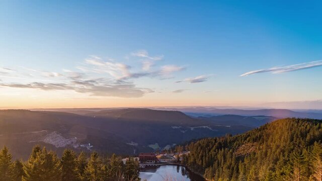 Top view of landscape of Mummelsee in Baden, Germany at sunrise, clouds in sky