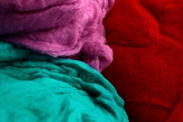 Sack made of natural sheep wool for felting. Merino yarn texture.