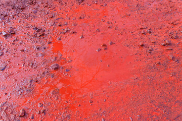 Close-up of red water polluted with iron ore waste