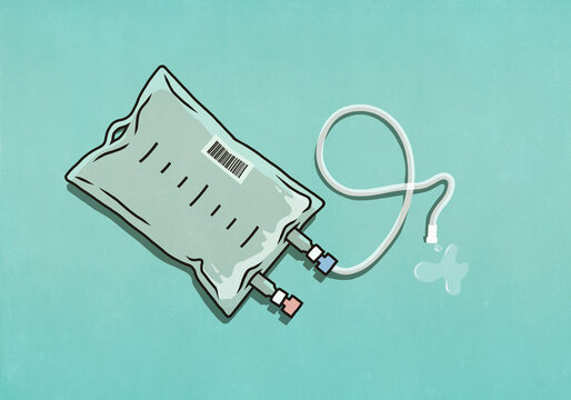 IV drip bag on turquoise background
