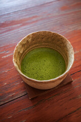 Matcha green tea cup on the table