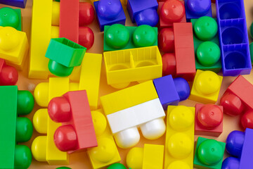 Colorful plastic toy blocks or brick toys. Child development concept.