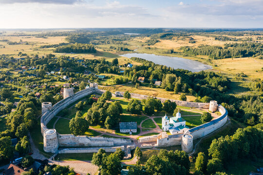 Aerial view of Izborsk Fortress at sunset. Travel sight in Pskov Oblast, Russia
