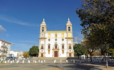 Fototapeta na wymiar Church of Carmo (Igreja do Carmo) in Largo do Carmo square, Faro, Algarve region in southern Portugal, Europe