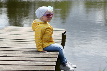 child on the pier