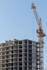 Fototapeta na wymiar The frame of a multi-storey monolithic building.