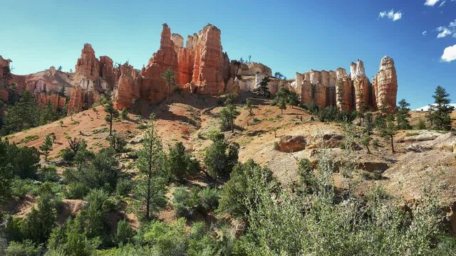 Red cliff rocks at Moss Cave trail at Bryce Canyon, UT, USA. Slider left to right