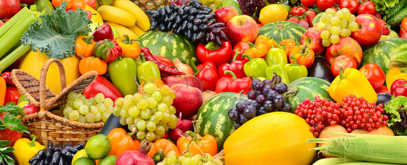 Large fruit background of fresh vegetables and fruits.